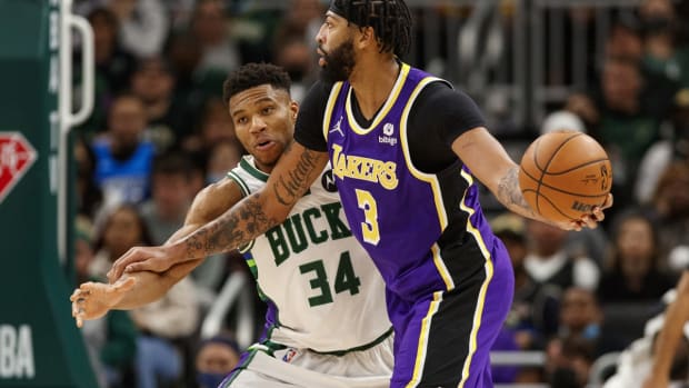 Nov 17, 2021; Milwaukee, Wisconsin, USA; Milwaukee Bucks forward Giannis Antetokounmpo (34) defends Los Angeles Lakers forward Anthony Davis (3) during the fourth quarter at Fiserv Forum. Mandatory Credit: Jeff Hanisch-USA TODAY Sports
